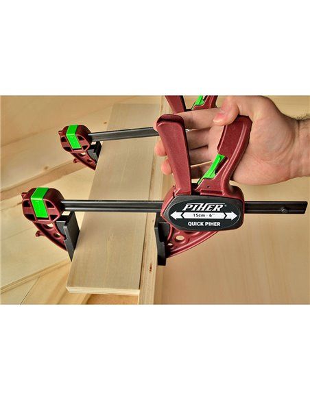 Sargento quick piher 30cm extra ref. 52630. presión máxima:150kg. cabezales de nylon y fibra de vidrio. barra de acero al carbon