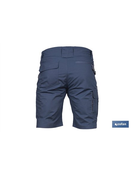 BERMUDAS DE TRABAJO TYR ELASTANO 215 G/M2 AZUL MARINO CON DETALLES GRISES TALLA 56
